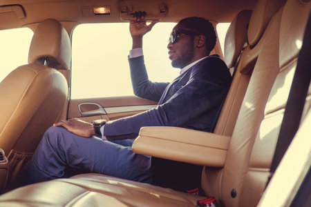 Stylish black man in the car.