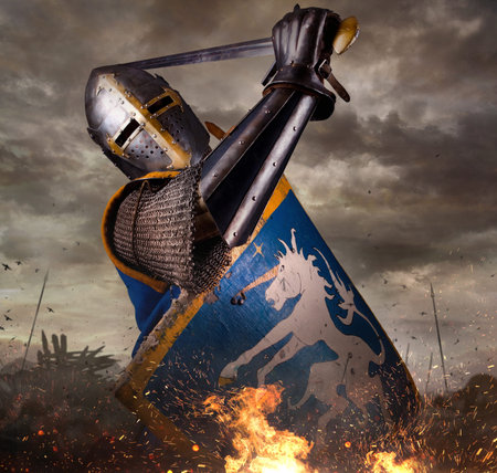 Knight in battle rise with sword.の写真素材