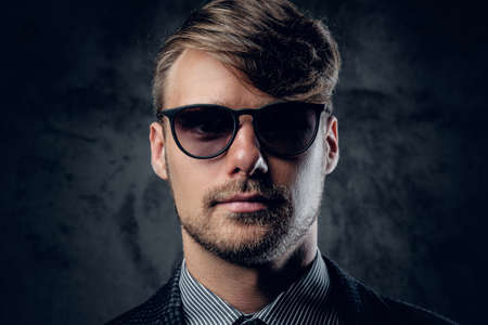 Studio portrait of glamour male in sunglasses.の写真素材