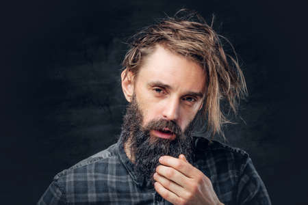 Portrait of bearded male with long hair.の写真素材