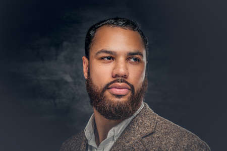 A handsome Black male dressed in a suit from a wool.の写真素材