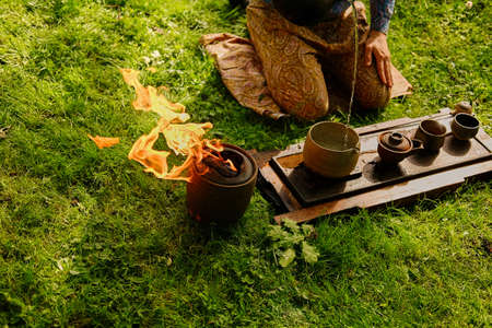 Chinese tea ceremony in a park.の写真素材