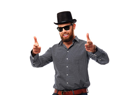Studio portrait of bearded hipster male in sunglasses and cylinder hat isolated on a white...