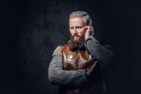 A man Viking dressed in Nordic armor.の写真素材