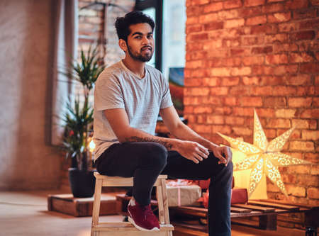 Indian male in the loft room.の写真素材