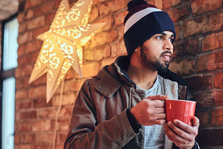 A man drinks coffee.の写真素材