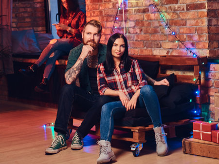 Party in a room with loft interior.の写真素材