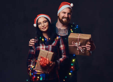 A man and woman over grey background.の写真素材