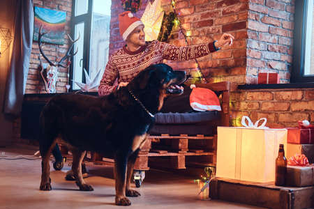 A man with a dog.の写真素材