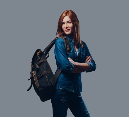 Redhead female in denim shirt.の写真素材