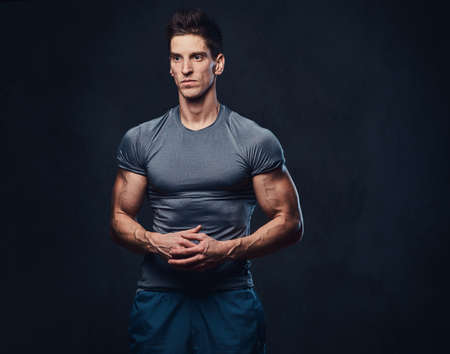 Athletic male dressed in a grey sportswear.の写真素材