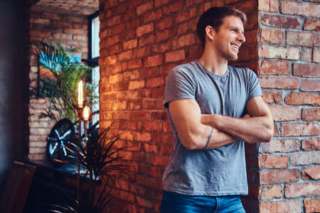 A handsome man with BMX in a studio.の写真素材