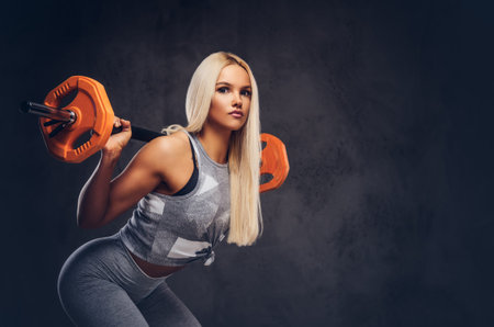 Studio portrait of a sporty woman.
