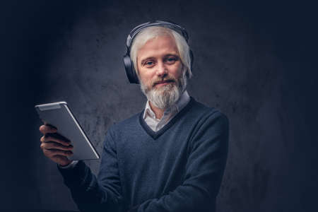 Portrait of an old man with a gray beard.
