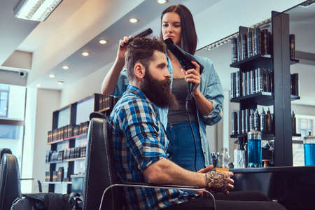 Handsome bearded man in the barbershop.の写真素材