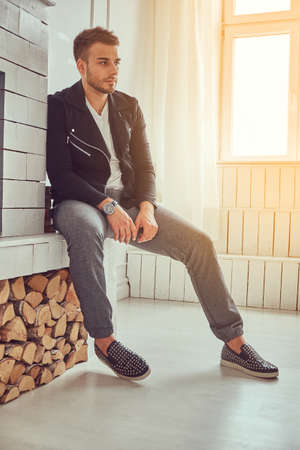 Portrait of a handsome male in a stylish clothingの写真素材