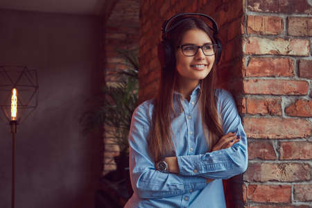 Portrait of a charming brunette in a studio.の写真素材