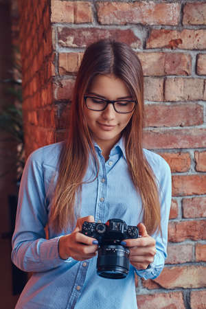 Portrait of a charming brunette in a studio.の写真素材