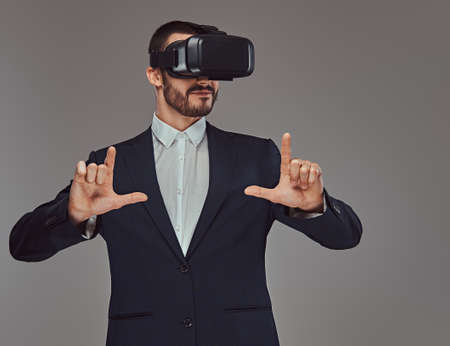 Studio portrait of a bearded businessman wearing a formal suitの写真素材