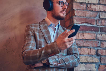 Portrait of a stylish man in a flannel suitの写真素材