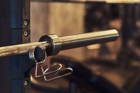 Close-up image of an exercise equipment barbell weights in sports gym.の写真素材