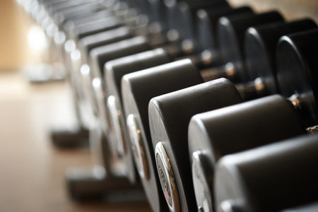 Closeup image of dumbells on a stand. Gym equipmentの写真素材