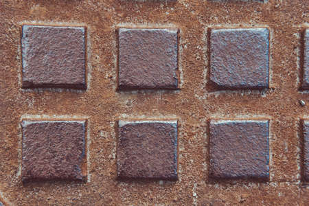 Metal relief for a walking path in construction area. Metal texture.の写真素材