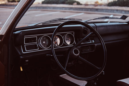Steering wheel and dashboard. Interior of a restored retro car.