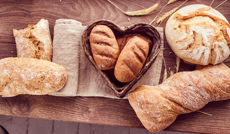 Hot freshly buns in a heart-shaped basket.