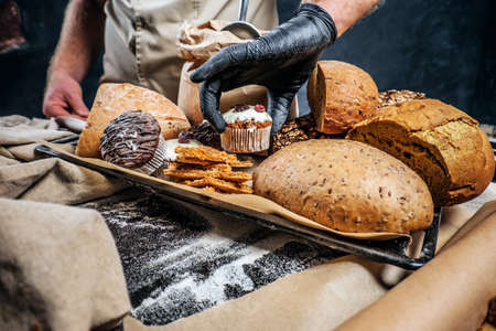 Close-up photo of a tray with freshly prepared products from his bakery