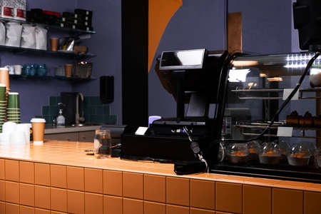 Cafe or coffee shop bar and counter with the coffee equipment.