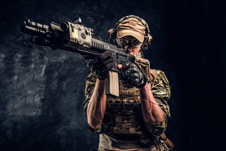 Private security service contractors, the elite special unit, full protective soldier holding...