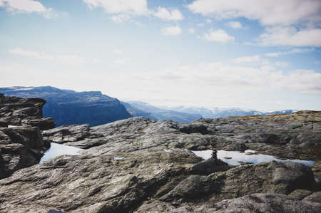 Travel around Norwegian national park at autumn season, hiking in mountains.の写真素材