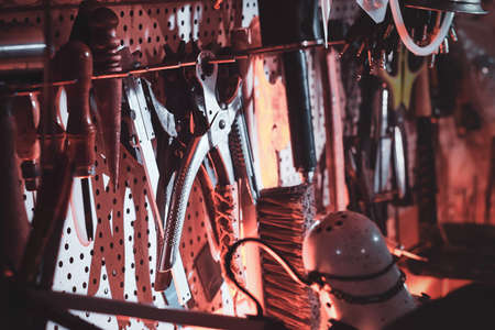 Big variety of tools at leather masters cabiet.の写真素材