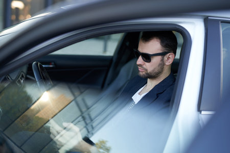 Brutal macho at the road to make some another money. Professional trader looking for some news in...