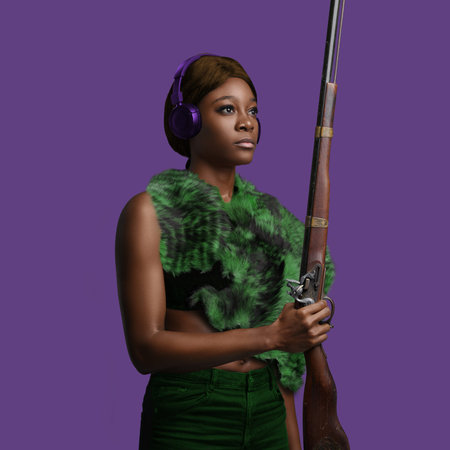 Black woman with gun dressed in trendy colorful clothing