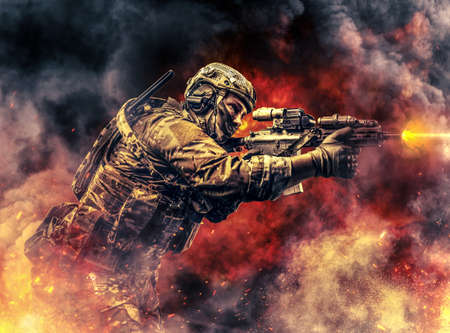 Modern soldier dressed in camouflage uniform holding rifle