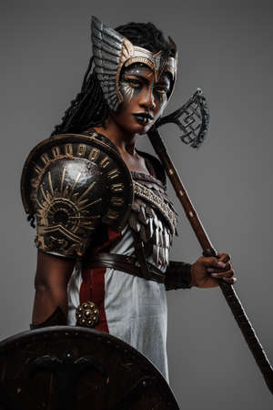 African woman amazon with shield and axe dressed in armor