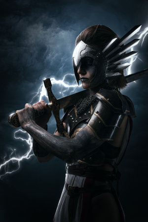 Dramatic warlike goddes with sword against thunderstikeの写真素材