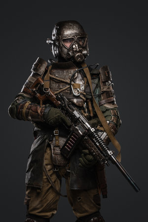 Post apocalyptic military survivor man dressed in protective cosの写真素材
