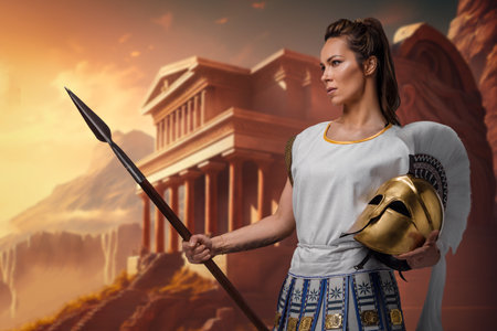 Greek female warrior with spear near ancient buildingの写真素材