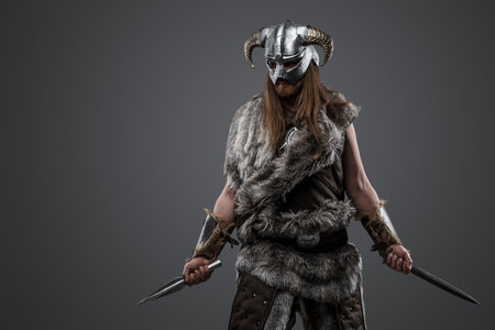Barbaric northern warrior with long hairs and horned helmetの写真素材