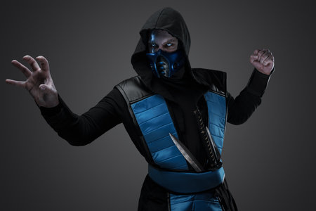 Shot of frozen fighter posing with his arm outstretchedの写真素材