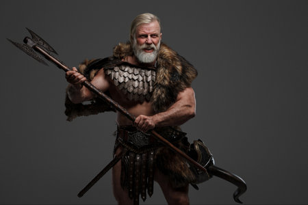 Grizzled elderly Viking warrior, displaying strength and wisdomの写真素材