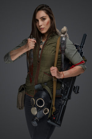 Middle eastern female survivor, dagger poseの写真素材