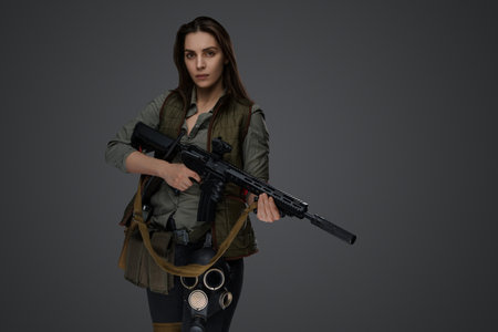 Middle Eastern Survivalist Woman with Rifleの写真素材