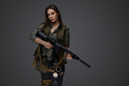 Middle Eastern Survivalist Woman with Rifleの写真素材