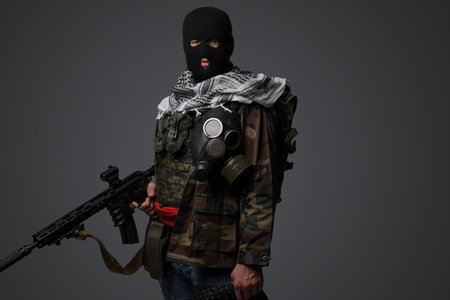 Middle Eastern Radical Soldier. Camouflaged Attire with Rifleの写真素材