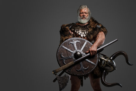 Grizzled elderly Viking warrior, displaying strength and wisdomの写真素材