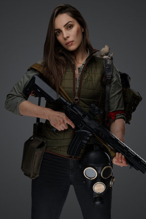Middle Eastern Survivalist Woman with Rifleの写真素材